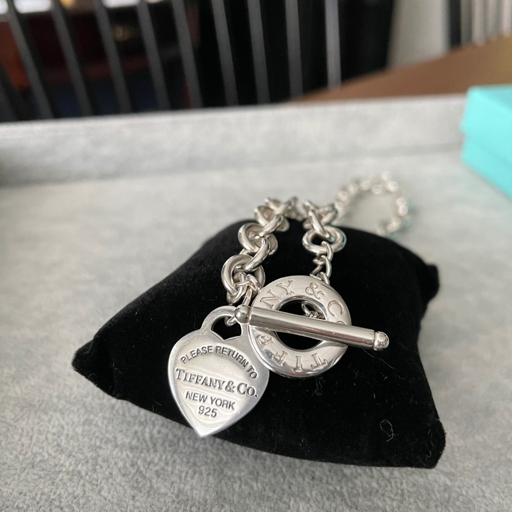 Return to Sender heart toggle necklace.